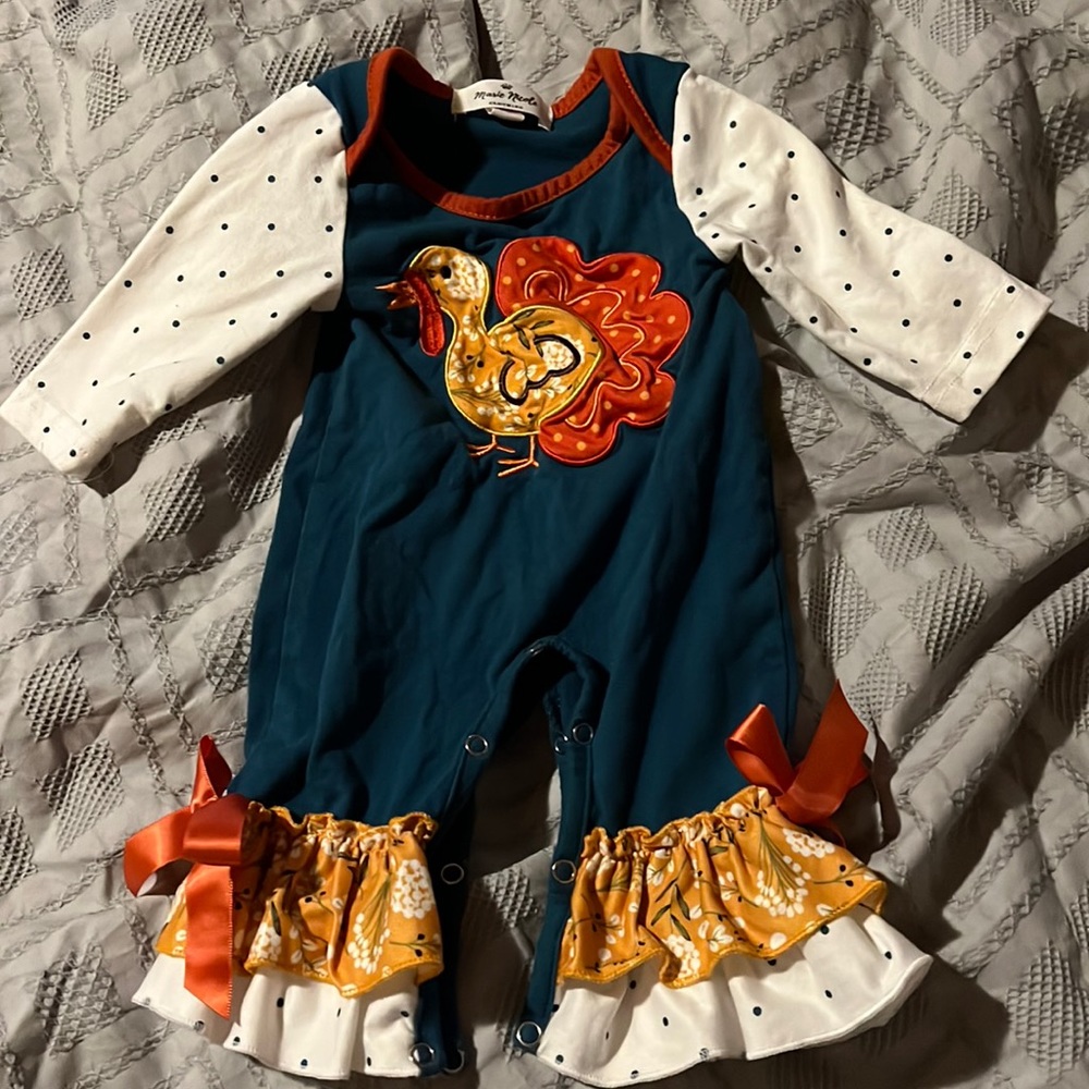 Turkey romper 0-3 months like new condition. Worn twice briefly each time.